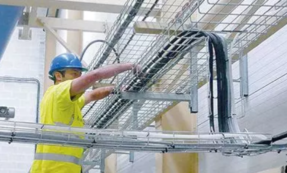 Installation of 50 m of metal cable trays for industrial electrical network