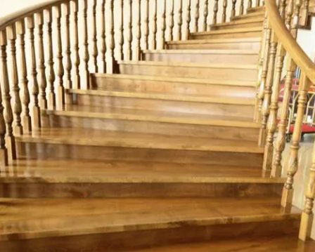 Wooden staircase renovation with varnished finish