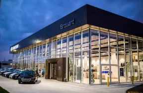 Interior/exterior cleaning of windows and frames of a car showroom
