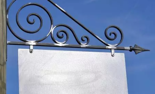 Creation of a custom metal sign for shop