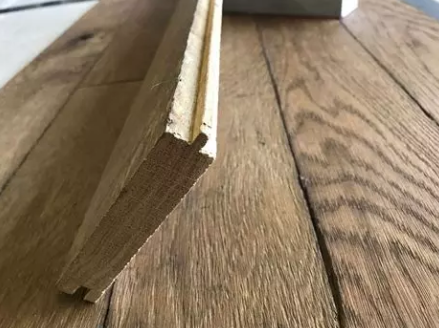 Replacement and integration of 20 damaged boards in solid wood parquet
