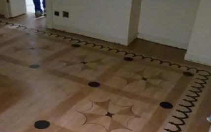 Creation and installation of a design parquet with decorative inlays